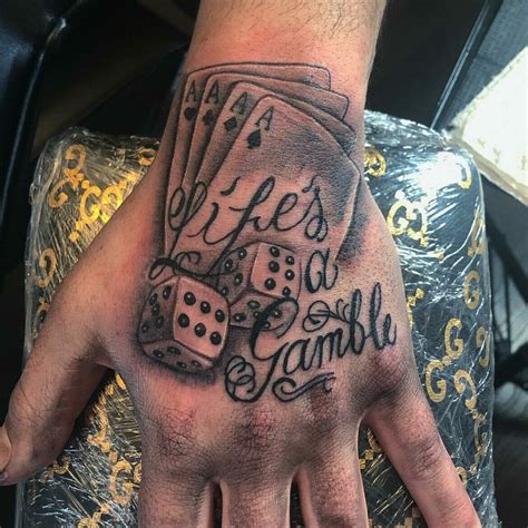 gambling hand tattoos